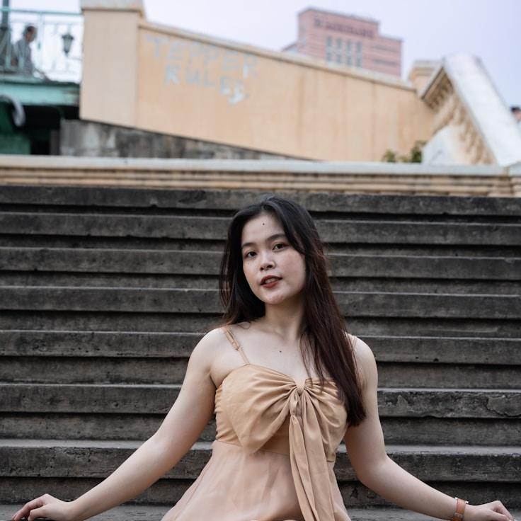 Kaveri Mehta, Lead Design Curator at NeutralVectorGuide, reviewing corporate floral arrangements